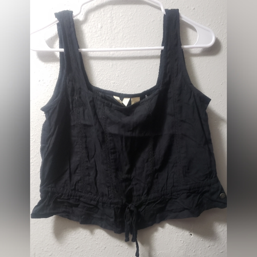 Roxy. Black 🖤 Crop tank with tie strings on bottom.